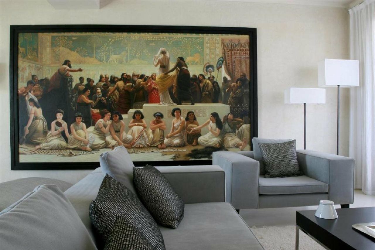 Les Jardins De La Koutoubia Hotel Marrakesh Eksteriør billede A living room with a painting